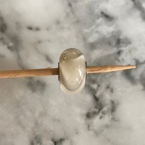 Cream glass armadillo glass charm